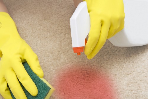 Professional cleaner in E1 working in a modern East London apartment